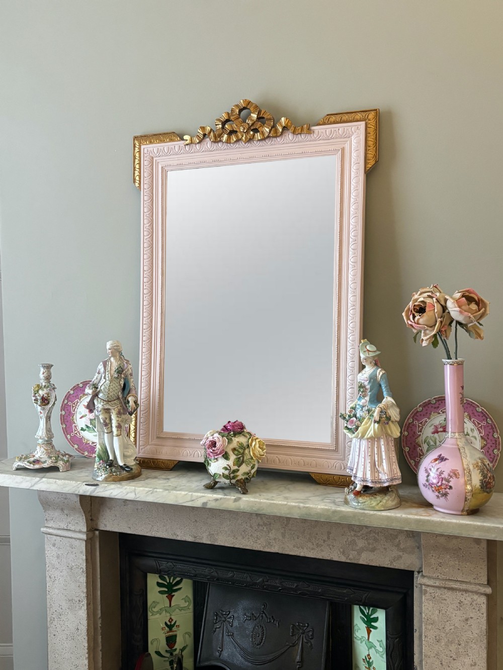 Rectangular late nineteenth-century French mirror featuring a painted white frame with gilded cresting and decorative corner accents. View IV