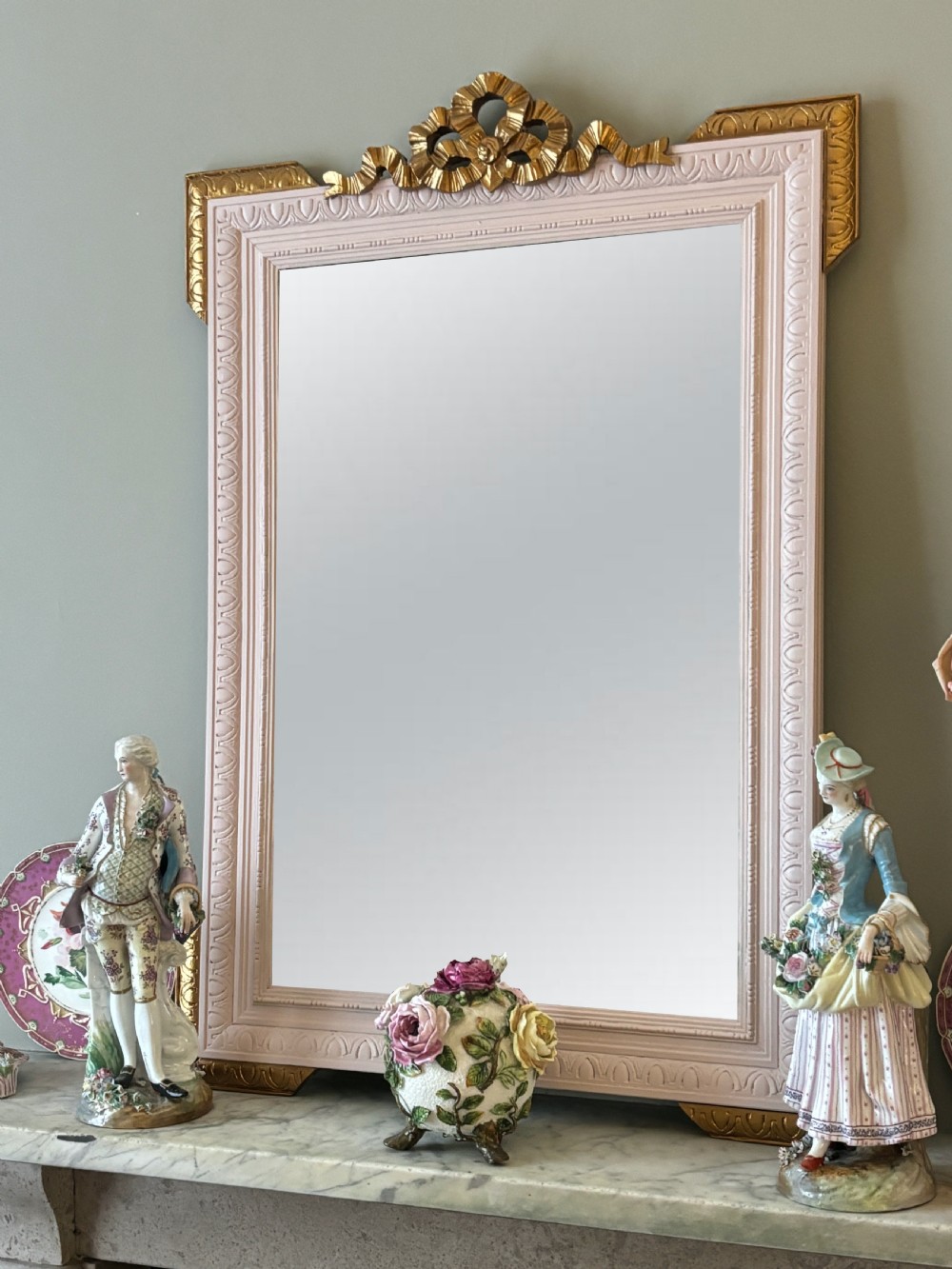 Rectangular late nineteenth-century French mirror featuring a painted white frame with gilded cresting and decorative corner accents. View V