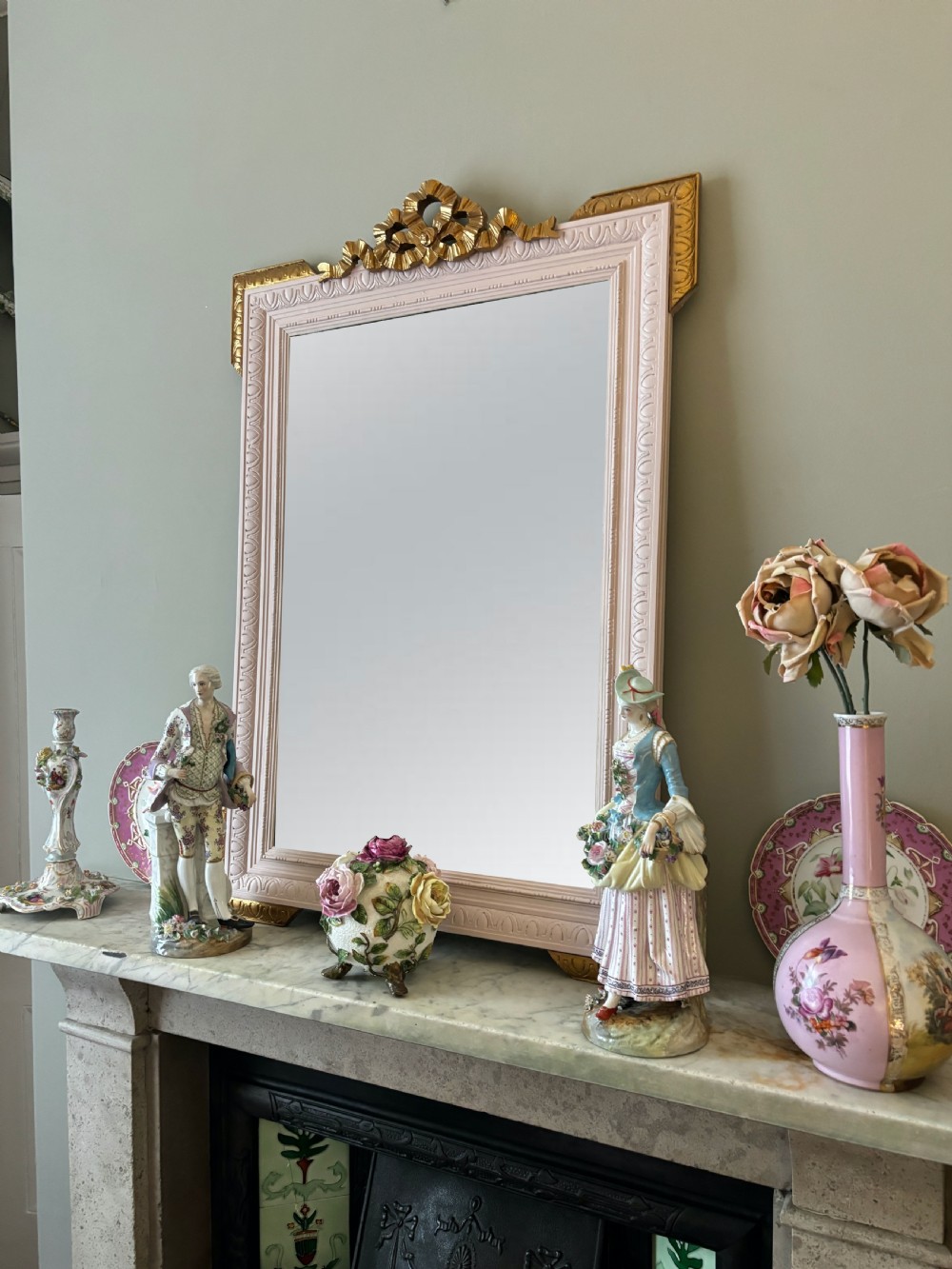 Rectangular late nineteenth-century French mirror featuring a painted white frame with gilded cresting and decorative corner accents. View VI