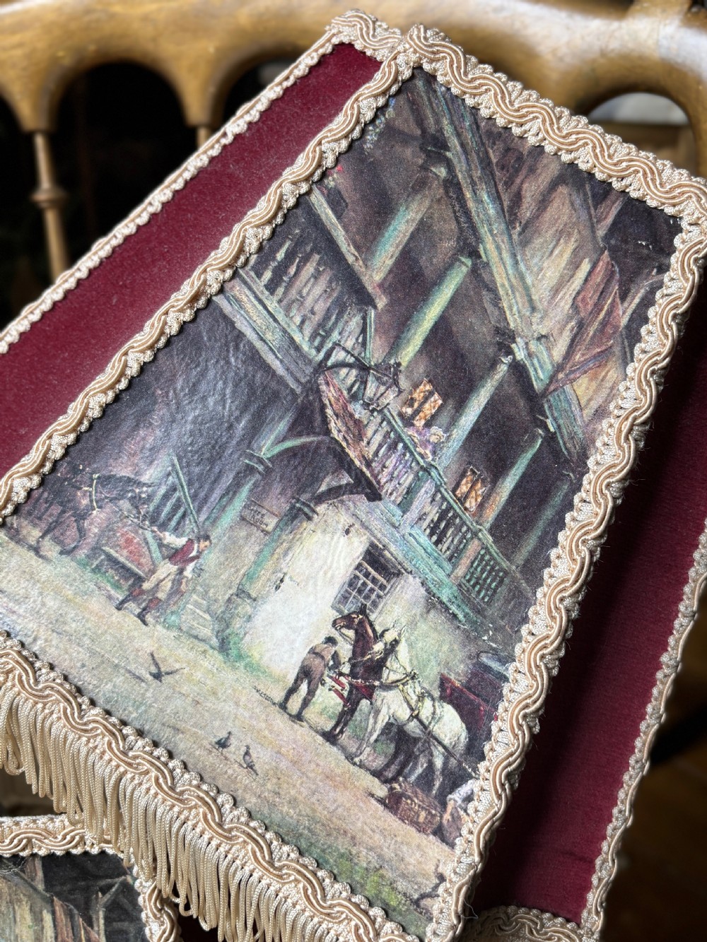 A pair of 1930s hexagonal lampshades featuring printed tavern scenes, deep burgundy fabric panels, braid trim, and lower fringe. View III