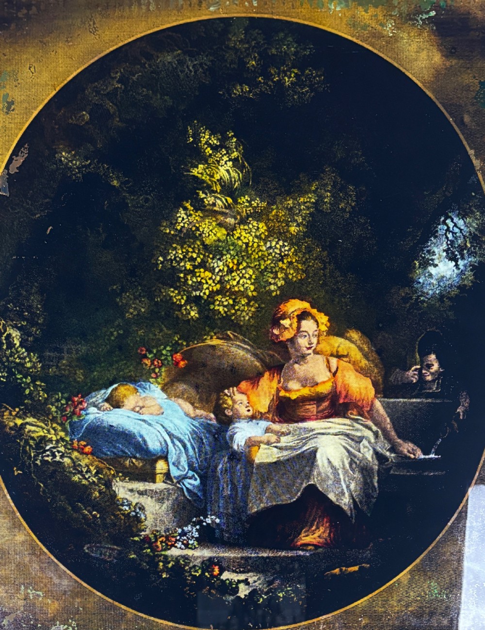 A Georgian reverse print on glass displaying a figure scene inside an oval vignette within a silvered moulded frame. View II