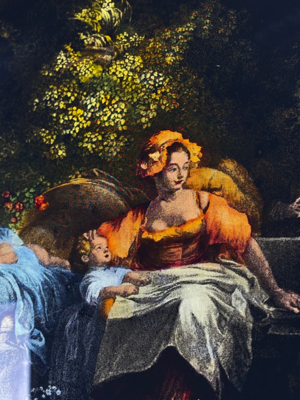 A Georgian reverse print on glass displaying a figure scene inside an oval vignette within a silvered moulded frame. View IV
