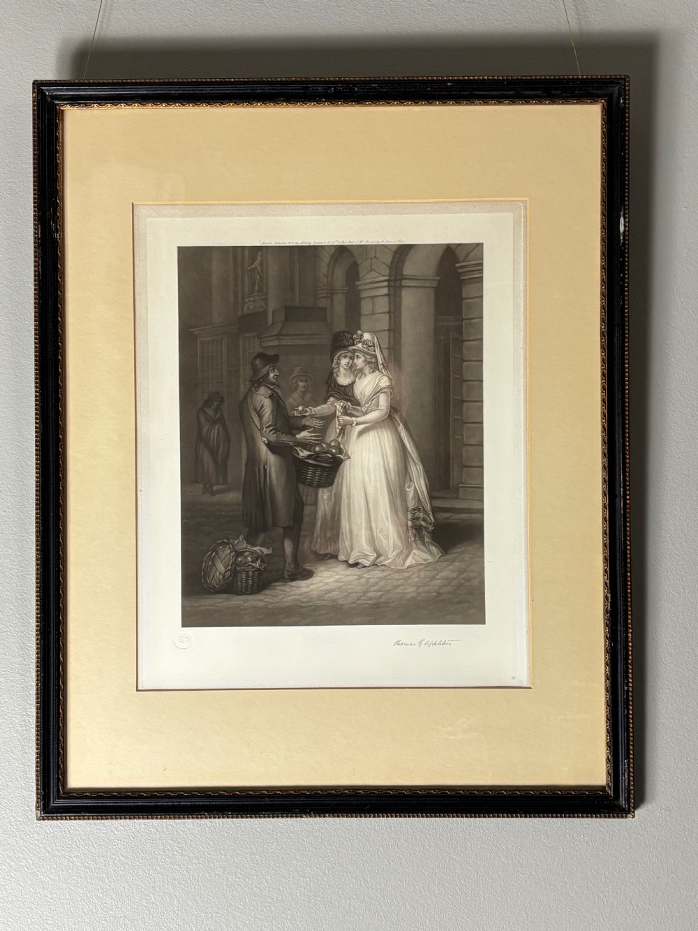A set of six uniformly framed 19th-century monochrome mezzotint prints depicting figurative street scenes with light cream mounts and dark wood frames. View X