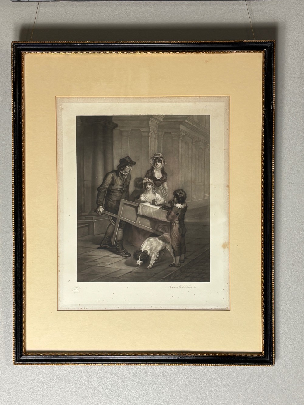 A set of six uniformly framed 19th-century monochrome mezzotint prints depicting figurative street scenes with light cream mounts and dark wood frames. View XI