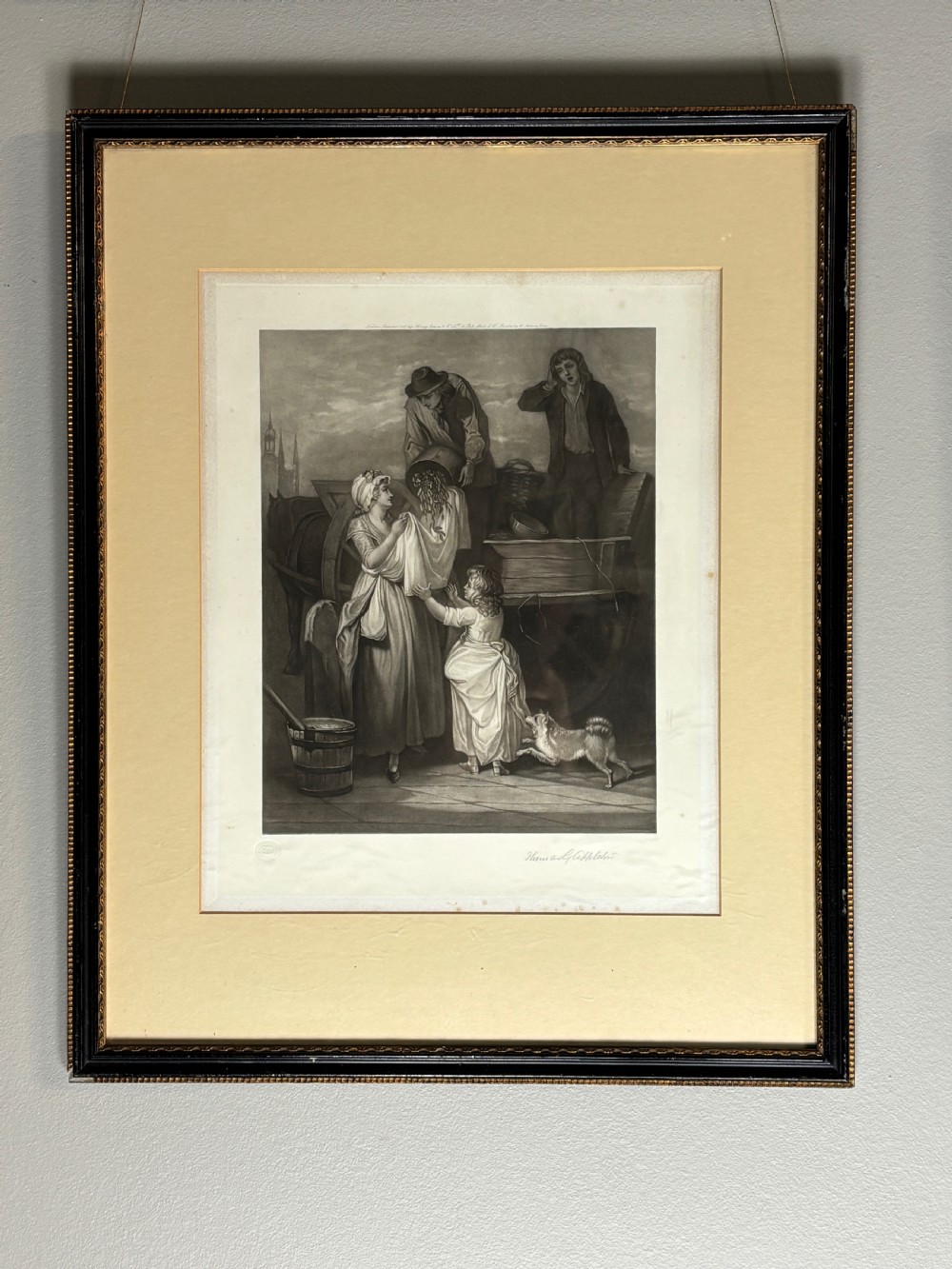 A set of six uniformly framed 19th-century monochrome mezzotint prints depicting figurative street scenes with light cream mounts and dark wood frames. View XII