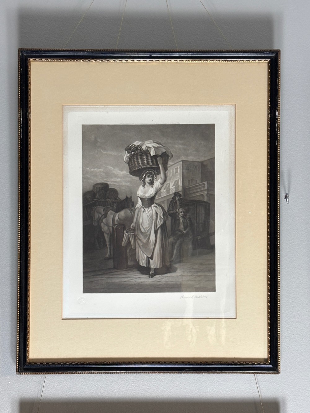 A set of six uniformly framed 19th-century monochrome mezzotint prints depicting figurative street scenes with light cream mounts and dark wood frames. View XIV