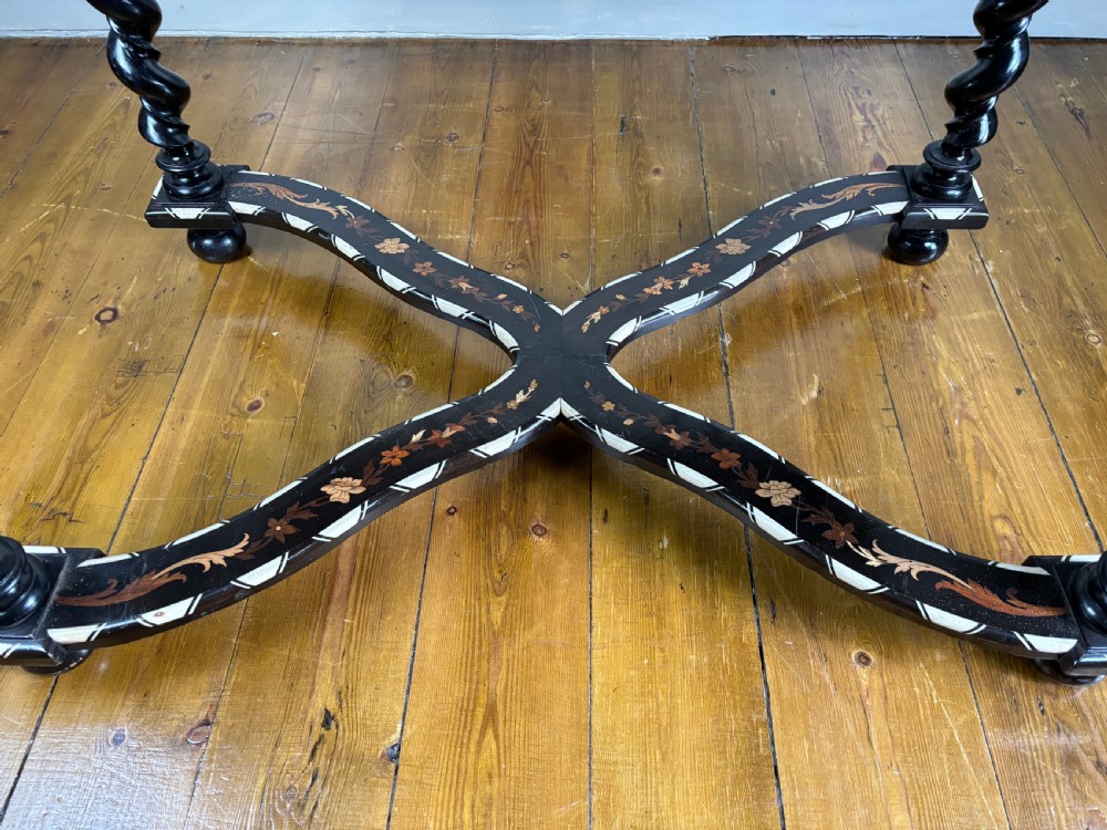 A 19th-century Dutch ebonised rectangular side table featuring floral marquetry, bone inlay borders, turned barley twist legs, and a shaped X-stretcher. View III