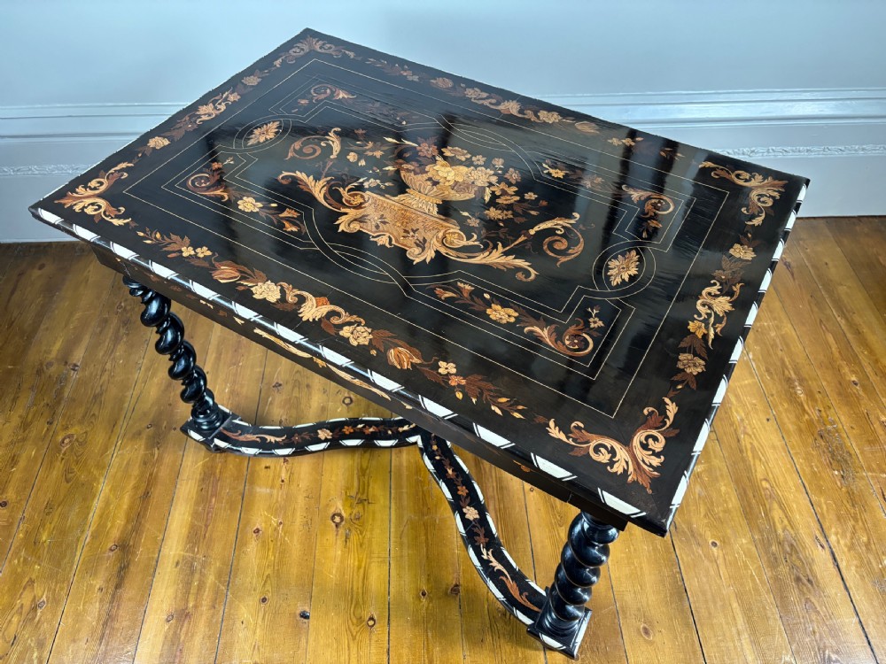 A 19th-century Dutch ebonised rectangular side table featuring floral marquetry, bone inlay borders, turned barley twist legs, and a shaped X-stretcher. View XI