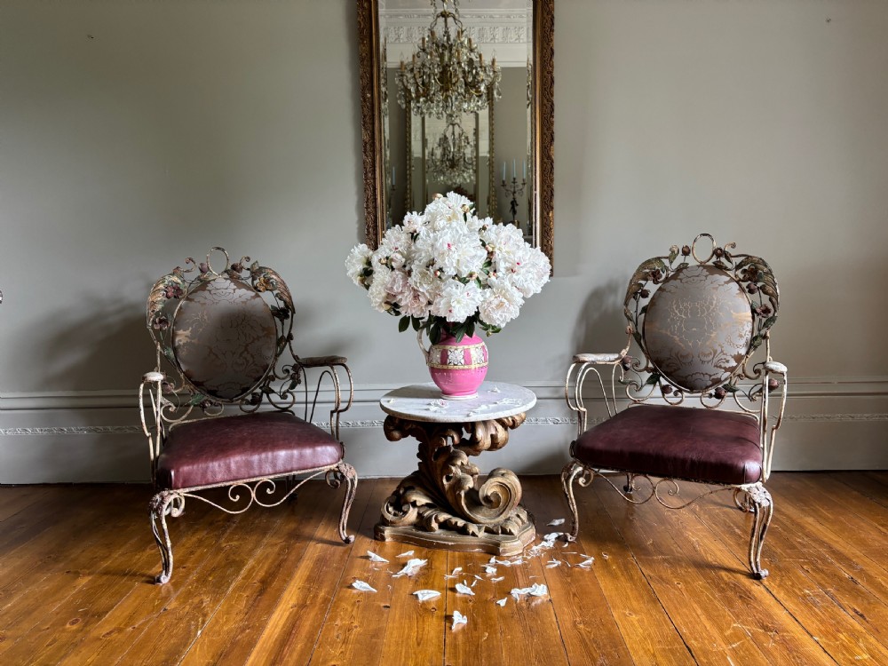 An 18th-century Italian Baroque side table featuring a circular white marble top set upon an ornately carved, gilded limewood base with acanthus leaf scrollwork. View III