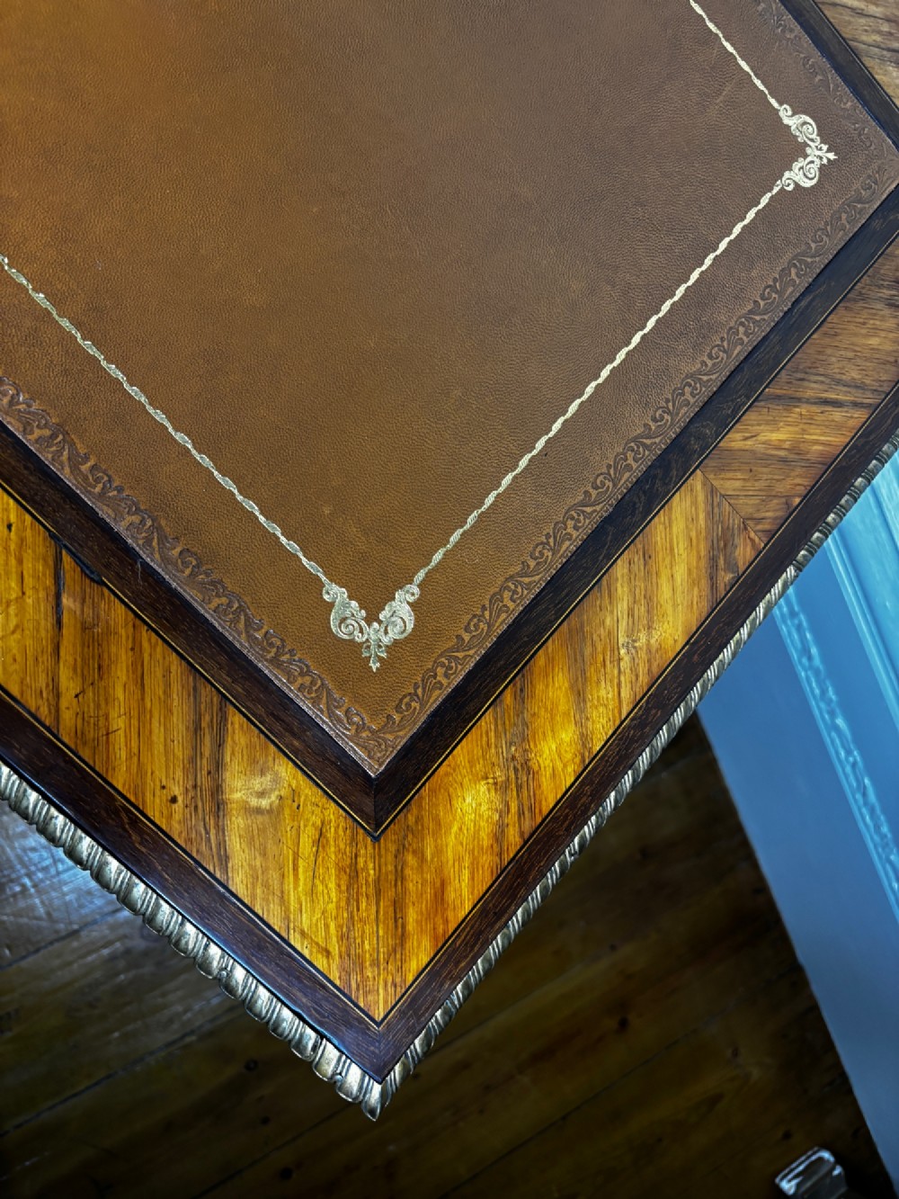 A Louis XV style rosewood writing table featuring cabriole legs, gilt bronze ormolu mounts, and turquoise porcelain plaques. View XII