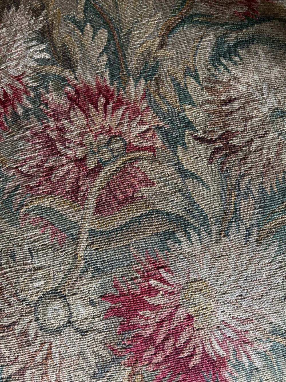 Late 19th-century French Regence style open armchair with a carved giltwood frame and floral tapestry upholstery. View V