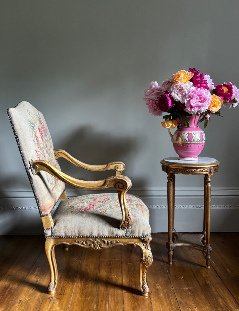 Late 19th-century French Regence style open armchair with a carved giltwood frame and floral tapestry upholstery. View IX