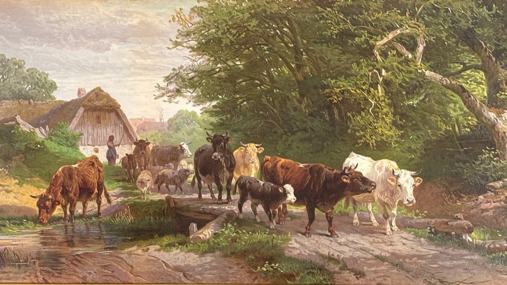 A pair of framed 19th-century pastoral oil paintings depicting rural landscapes with cattle and figures, set within matching giltwood frames. View II