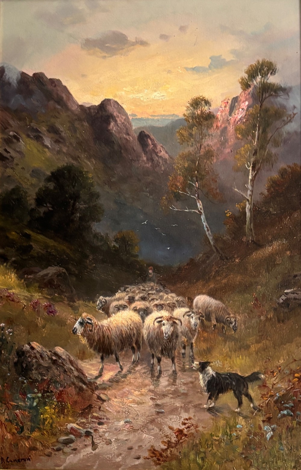 An oil painting on canvas depicting a flock of sheep and a sheepdog on a Scottish mountain path at sunset, presented in an ornate giltwood frame. View III