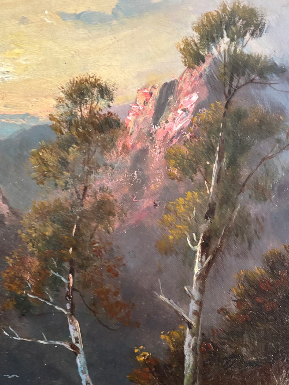 An oil painting on canvas depicting a flock of sheep and a sheepdog on a Scottish mountain path at sunset, presented in an ornate giltwood frame. View VI