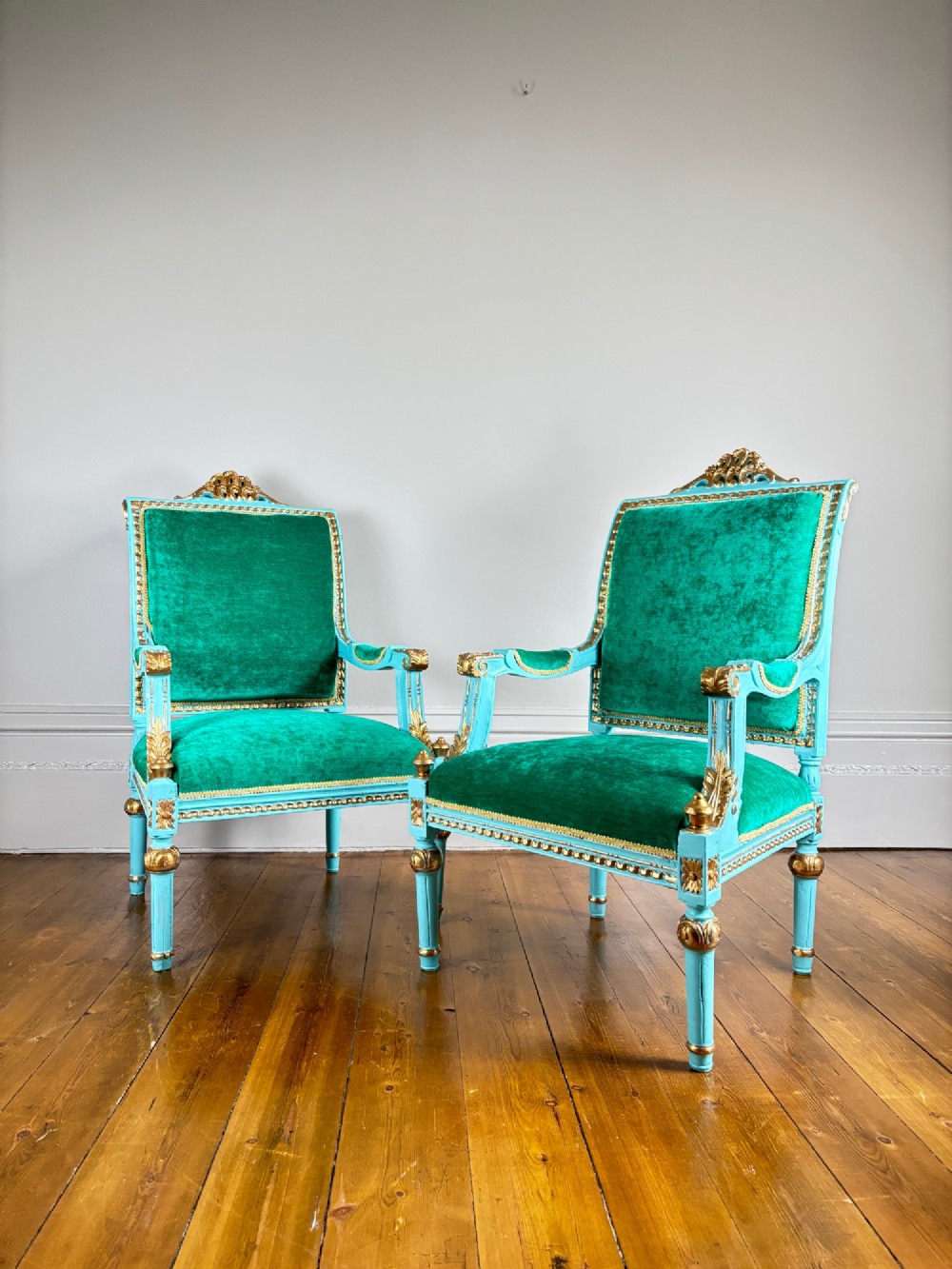 A pair of mid-19th-century French open armchairs featuring turquoise painted frames with gold gilt detailing and emerald green velvet upholstery. View III