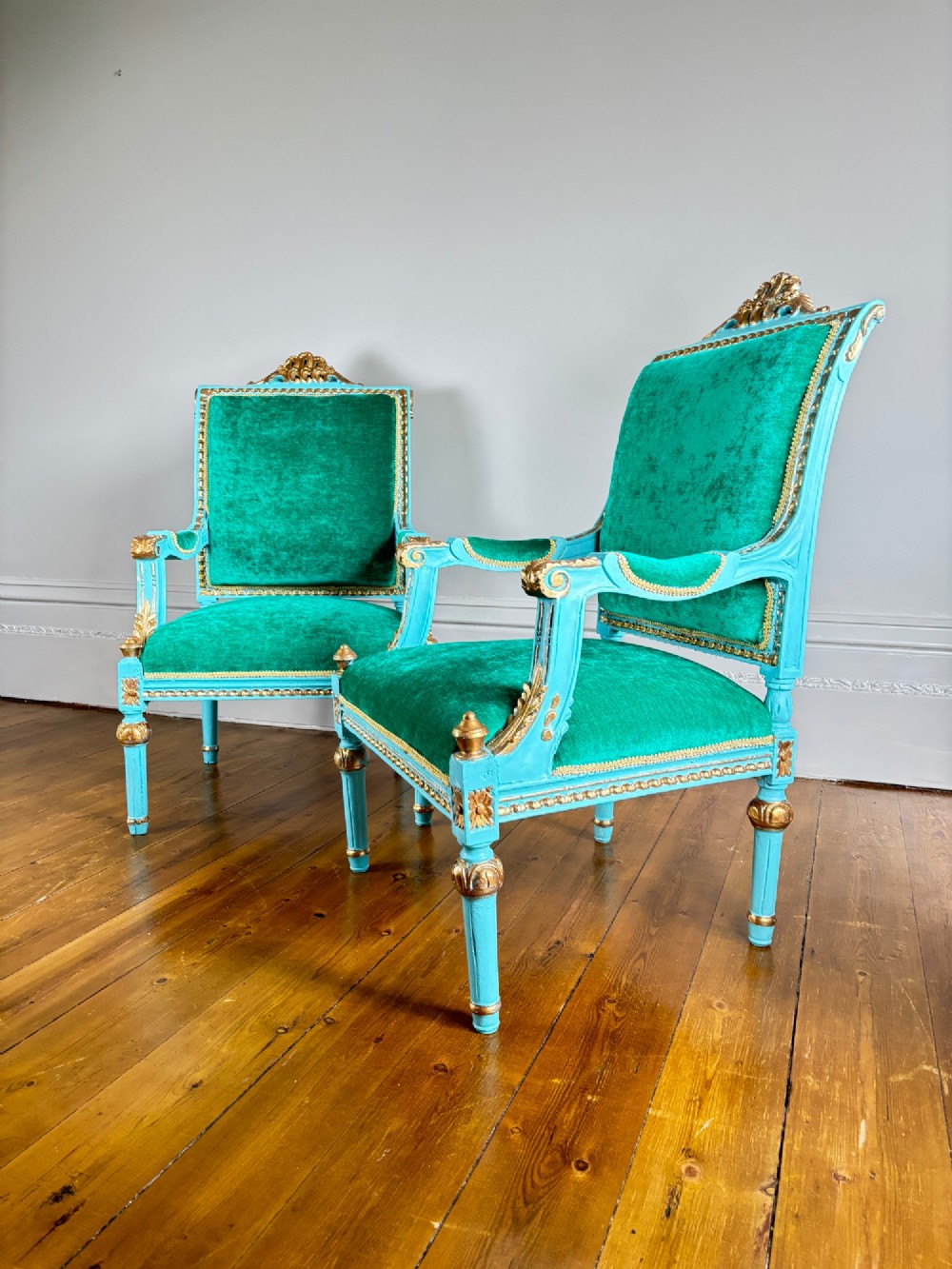 A pair of mid-19th-century French open armchairs featuring turquoise painted frames with gold gilt detailing and emerald green velvet upholstery. View IV