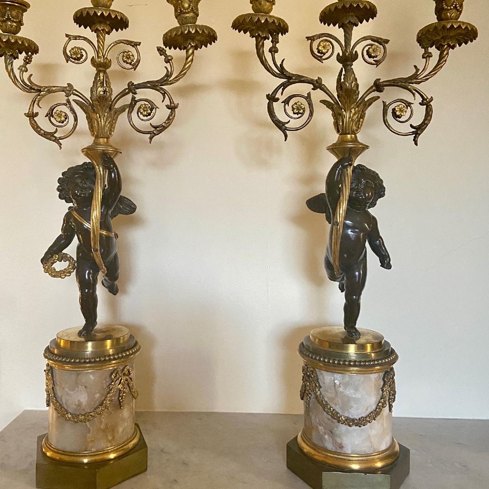 A Pair of Late Louis Xvi Period Patinated Bronze Putti & Fluorspar Candelabra. After Francois Redmond.