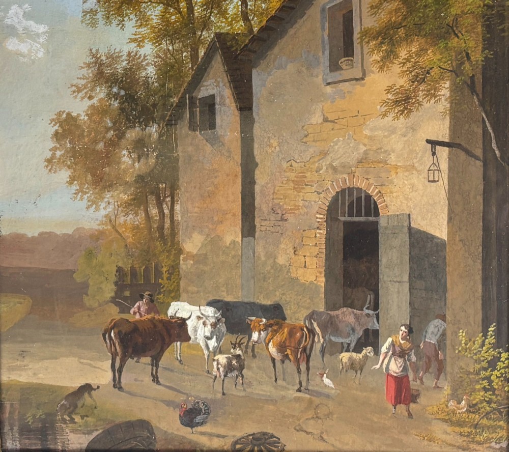A framed gouache painting depicting a rural farmyard scene with livestock and rustic stone buildings set within an ornate gilded frame. View III