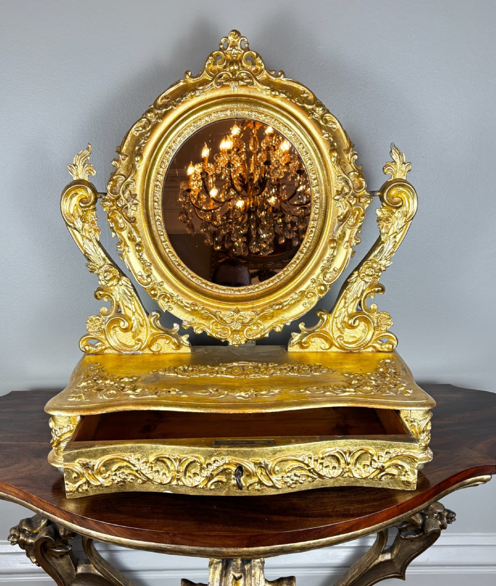 An Italian Giltwood & Gesso Table Mirror 18thc View III