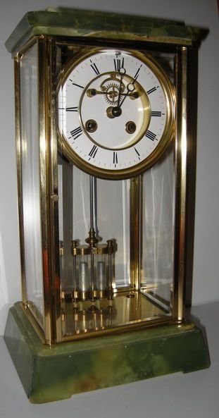 French Brass and Green Onyx Four Glass Clock.