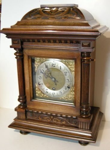 A Westminster Chiming Walnut Clock.