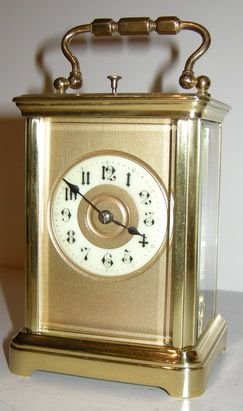 A Small French Strike/repeat Brass Cased Carriage Clock.