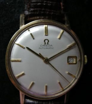 A 1964 Gents Omega Automatic 9ct Gold Wristwatch.