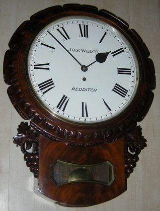 Fusee Wall Clock by Welch, Redditch
