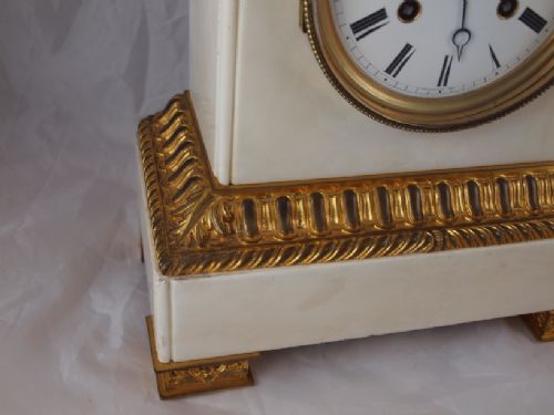 fig 1. French white marble child and dog mantel clock