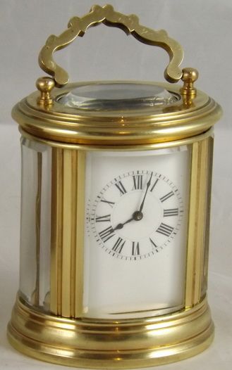 A Rare Oval Miniature Carriage Clock by Henri Jacot