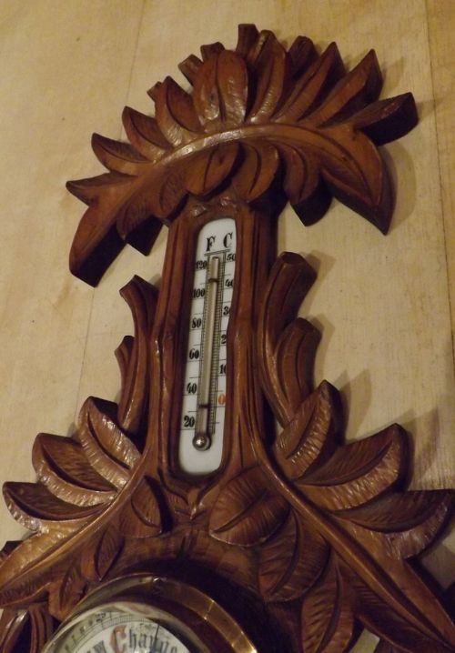 fig 1. A well carved aneroid barometer