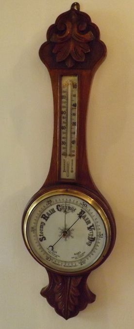 A Well Carved Aneroid Barometer