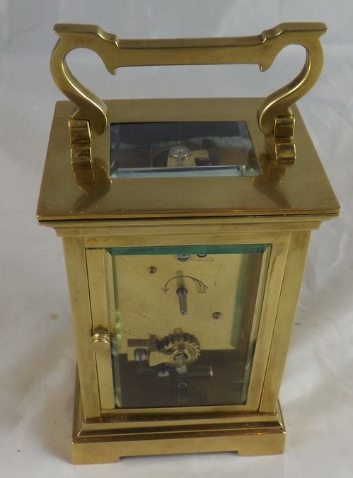 fig 1. A French brass cased enamel carriage clock