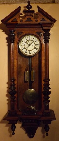 A Twin Weight Vienna Wall Clock