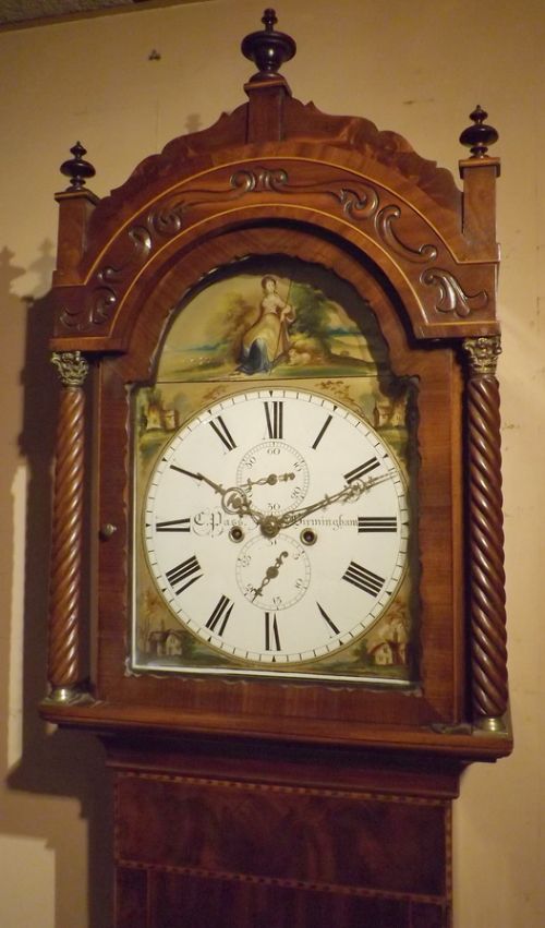 fig 1. An antique mahogany longcase clock, Pass Oldbury