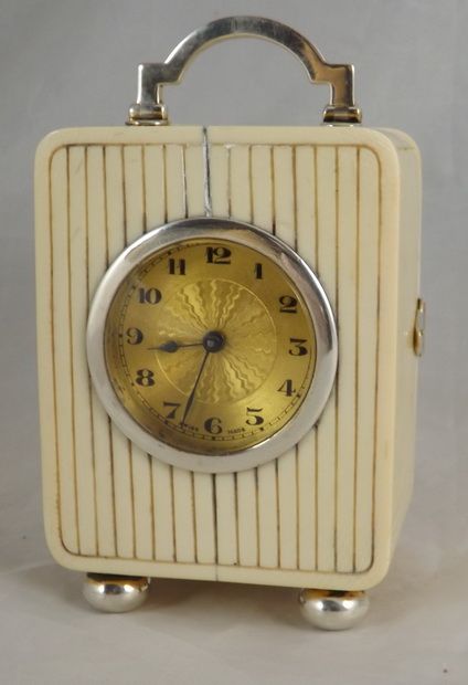 An Ivory and Silver Carriage Clock