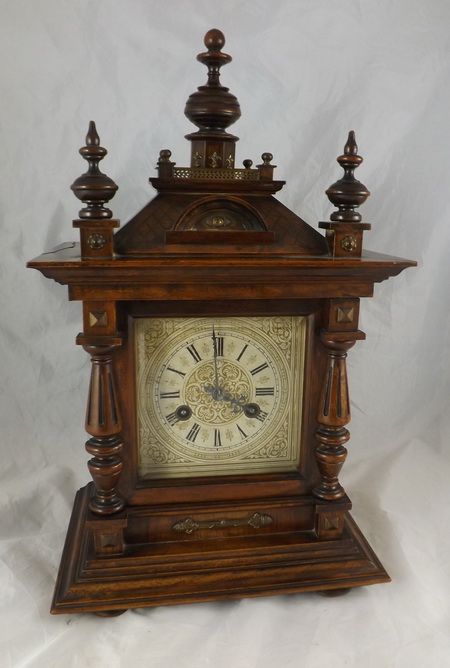 A Walnut German Mantel Clock
