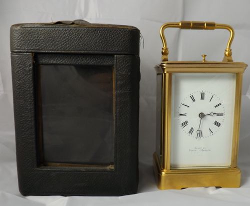 Strike Repeat Gilded Case Carriage Clock by Rety Poll