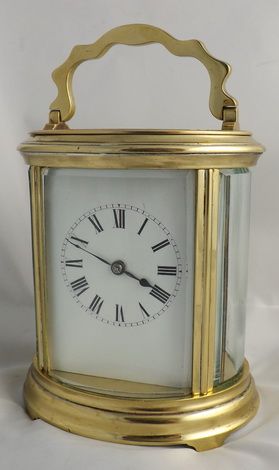 Antique French Oval Cased Striking Carriage Clock