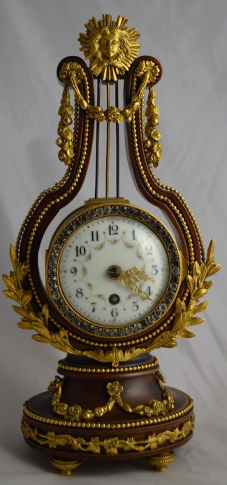 A Small French Lyre Mantel Clock