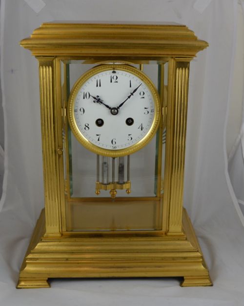 Four Glass Mantel Clock