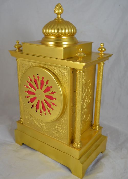 fig 1. A French Gilt Clock Set with original side vases