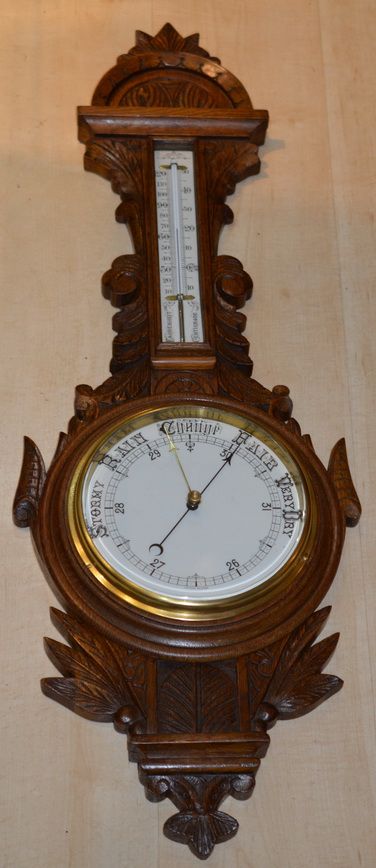 A Victorian Carved Oak Barometer