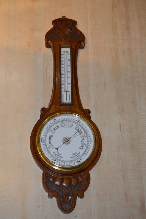 A Victorian Carved Aneroid Barometer