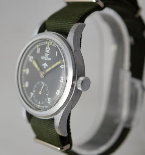fig 2. Lemania Wrist Watch 1953 Fat Arrow Military Mark
