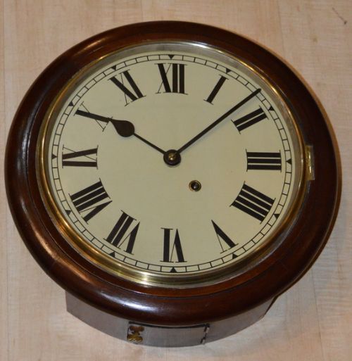 An Oak Cased Dial Clock