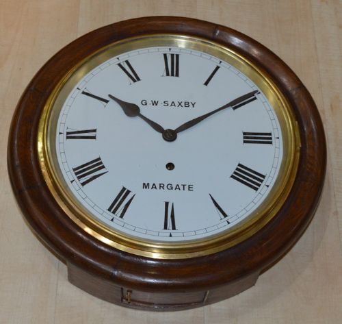 An Oak Dial Clock by Saxby of Margate
