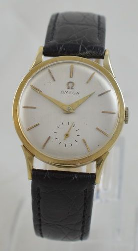 A  1954 Gold Omega Wristwatch