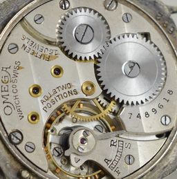 fig 1. 1930s Omega Cushion Cased Wristwatch with box
